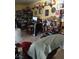 The living room displays shelves with collectible items and a light yellow wall at 4727 Conrad St, Las Vegas, NV 89121