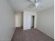 This bedroom has carpet flooring and a closet with sliding doors at 4795 Via San Andros, Las Vegas, NV 89103