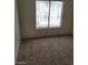 Bedroom with carpeting and a window at 4795 Via San Andros, Las Vegas, NV 89103