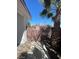 Side yard with gated access, ensuring privacy and security for outdoor spaces of the property at 4795 Via San Andros, Las Vegas, NV 89103
