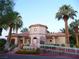 Attractive building exterior with lush landscaping, easy ramp access, and covered entry at 5041 Portraits Pl, Las Vegas, NV 89149