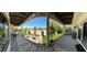 Spacious covered patio with outdoor seating and a built-in grill at 5041 Portraits Pl, Las Vegas, NV 89149