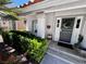 Inviting front porch with well-maintained landscaping and decorative accents at 5041 Portraits Pl, Las Vegas, NV 89149