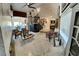 Open-concept living room with high ceilings and access to the staircase at 5041 Portraits Pl, Las Vegas, NV 89149