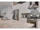Bright kitchen with granite countertops, stainless steel appliances, and stylish tile backsplash at 505 Sterling Falls Ave, Henderson, NV 89011