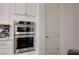 Kitchen with built-in stainless steel oven and microwave perfect for cooking enthusiasts at 505 Sterling Falls Ave, Henderson, NV 89011