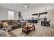 Open-concept living space seamlessly connects the kitchen, dining area, and living room at 505 Sterling Falls Ave, Henderson, NV 89011