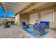 Charming covered patio with stylish seating, a ceiling fan, and access to outdoor entertaining space at 505 Sterling Falls Ave, Henderson, NV 89011