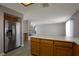 Spacious kitchen shows stainless steel refrigerator and ample counter space at 5204 Padua Way, Las Vegas, NV 89107