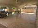 Spacious covered patio includes multiple ceiling fans and plenty of room for entertaining at 5204 Padua Way, Las Vegas, NV 89107