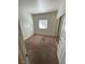 Bedroom featuring carpet floors, window, and closet with sliding doors at 5250 S Rainbow Blvd # 1010, Las Vegas, NV 89118