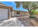 Charming single-story home with a well-maintained front yard and attached garage at 5257 Sunbury Ave, Las Vegas, NV 89122