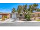 Charming single-story home featuring a one-car garage and mature landscaping in a tranquil neighborhood at 5257 Sunbury Ave, Las Vegas, NV 89122