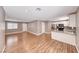 Open-concept living space with luxury vinyl plank flooring and easy access to the updated kitchen at 5257 Sunbury Ave, Las Vegas, NV 89122