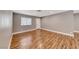 Spacious living room featuring luxury vinyl plank flooring and a large window for natural light at 5257 Sunbury Ave, Las Vegas, NV 89122
