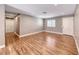 Inviting living room with neutral tones, LVP flooring, and recessed lighting at 5257 Sunbury Ave, Las Vegas, NV 89122