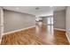 Spacious living area with luxury vinyl plank flooring, and easy access to kitchen at 5257 Sunbury Ave, Las Vegas, NV 89122