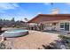 Backyard with hot tub, covered patio, and plenty of space for outdoor entertaining at 5317 Marietta Ave, Las Vegas, NV 89108
