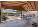 Enjoy this backyard patio with a jacuzzi, seating area, and outdoor grill for entertaining at 5317 Marietta Ave, Las Vegas, NV 89108