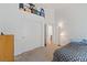 Spacious bedroom with closet, storage, carpet flooring, and neutral-toned walls at 5317 Marietta Ave, Las Vegas, NV 89108