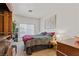 Cozy bedroom featuring a large window, and traditional furniture at 5317 Marietta Ave, Las Vegas, NV 89108