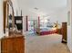 Serene primary bedroom with natural light, and carpet flooring leading to an outdoor patio at 5317 Marietta Ave, Las Vegas, NV 89108