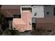 Aerial view showcasing the house's red tile roof, backyard patio, and surrounding neighborhood at 5400 Paul Kurtz Way # 105, Las Vegas, NV 89108