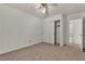 Carpeted bedroom with closet and ensuite bathroom at 5400 Paul Kurtz Way # 105, Las Vegas, NV 89108