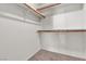 Walk-in closet with carpet, shelving and racks for clothing storage at 5400 Paul Kurtz Way # 105, Las Vegas, NV 89108
