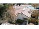 Charming single-story home with well-kept landscaping and a classic red tile roof at 5400 Paul Kurtz Way # 105, Las Vegas, NV 89108