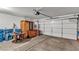 View of the spacious garage with an automatic door and room for storage at 5400 Paul Kurtz Way # 105, Las Vegas, NV 89108