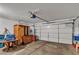 View of the spacious garage with an automatic door and room for storage at 5400 Paul Kurtz Way # 105, Las Vegas, NV 89108