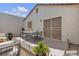 Staged patio featuring dining and seating area at 5400 Paul Kurtz Way # 105, Las Vegas, NV 89108