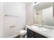 Clean bathroom featuring a modern vanity, framed mirror, and coordinated fixtures at 5524 La Pelusa St, North Las Vegas, NV 89031