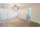 Inviting bedroom with ceiling fan, closet, and a window providing ample natural light at 5524 La Pelusa St, North Las Vegas, NV 89031
