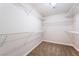 Spacious walk-in closet featuring wire shelving for organized storage and carpet flooring at 5524 La Pelusa St, North Las Vegas, NV 89031