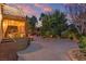 Spacious backyard with a covered seating area, perfect for outdoor relaxation and entertainment at 556 Caribbean Palm Dr, Las Vegas, NV 89138