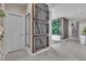 Hallway featuring stylish decor and open access to other areas of the home at 556 Caribbean Palm Dr, Las Vegas, NV 89138