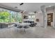 Bright living area flows to the outside with a large sliding glass door, seamlessly blending indoor and outdoor at 556 Caribbean Palm Dr, Las Vegas, NV 89138