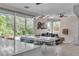 Open-concept living space seamlessly connects indoor and outdoor living with large sliding glass doors at 556 Caribbean Palm Dr, Las Vegas, NV 89138