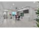 Spacious home office with ample storage and a modern desk, situated near a bright stairwell at 556 Caribbean Palm Dr, Las Vegas, NV 89138