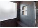Walk-in shower with built in bench, shampoo shelves and rainfall shower head at 6110 Pebble Glen Ct, Las Vegas, NV 89149