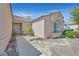 Charming single-story home with desert landscaping, a tiled roof, and a quaint walkway at 6125 Desert Haven Rd, Las Vegas, NV 89130