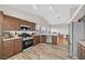 Updated kitchen with stainless steel appliances and granite countertops at 6125 Desert Haven Rd, Las Vegas, NV 89130