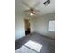 Bedroom featuring neutral walls, carpet, ceiling fan, and ensuite bathroom at 6316 Beige Bluff St # 201, North Las Vegas, NV 89081