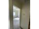 Empty carpeted bedroom with a neutral color scheme and natural light coming from the window at 6316 Beige Bluff St # 201, North Las Vegas, NV 89081