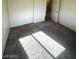 A empty bedroom featuring a closet with carpeted floors and natural light at 6316 Beige Bluff St # 201, North Las Vegas, NV 89081