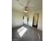 Bedroom with carpet, ceiling fan, and view to adjoining room at 6316 Beige Bluff St # 201, North Las Vegas, NV 89081