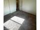 Empty bedroom with a closet and carpeted floors at 6316 Beige Bluff St # 201, North Las Vegas, NV 89081