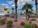 View of a home in a well-maintained community with mature landscaping and ample parking at 6316 Beige Bluff St # 201, North Las Vegas, NV 89081